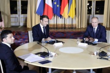 Путин и Зеленский в Париже нашли пути к прогрессу в "Минске-2"