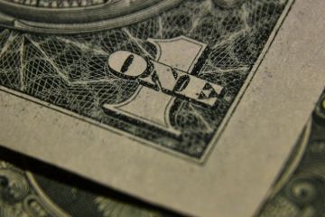 Цена на золото и серебро поднялась из-за снижения ставки ФРС США