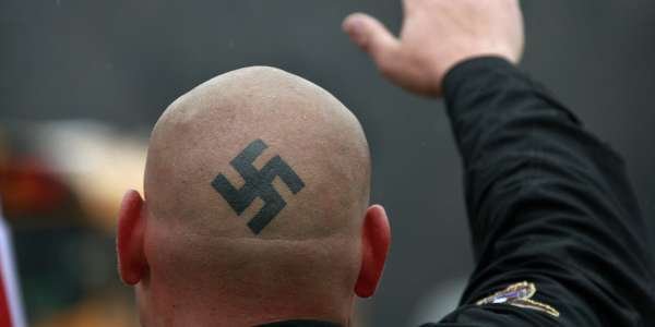 Череп, кости, два ствола. Международный экстремизм пускает корни в Беларуси?